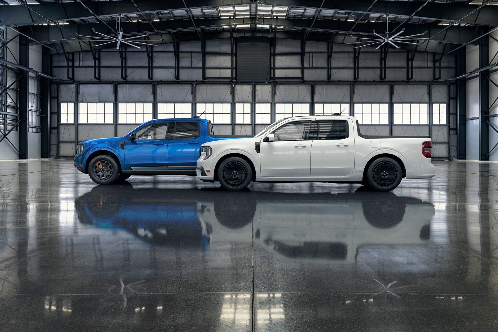 White and Blue Ford Maverick in wearhouse