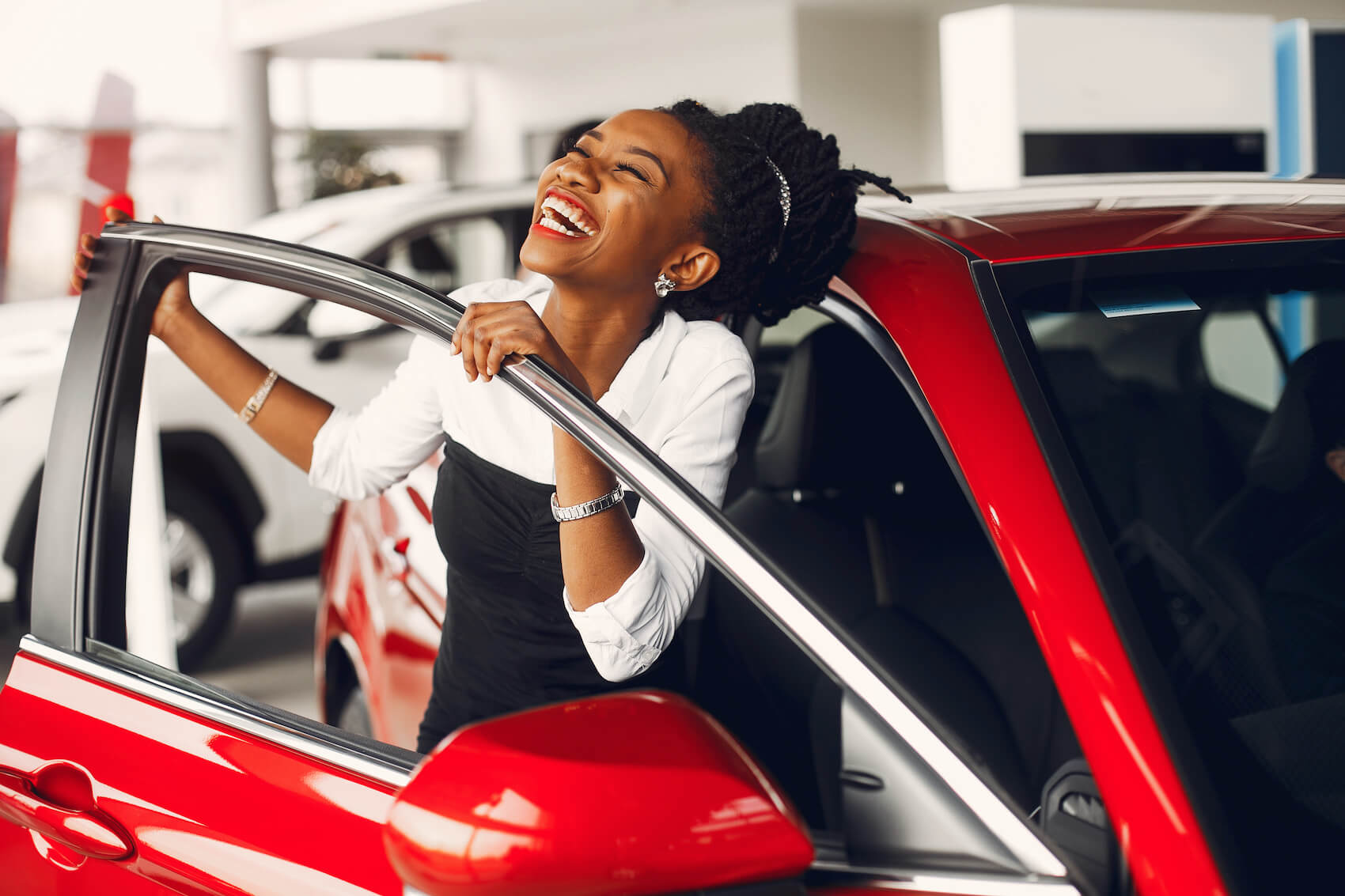 Woman excited about vehicle